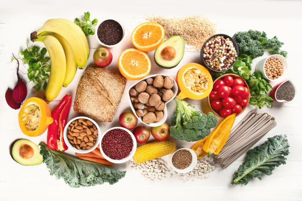 High-fiber foods including beans, whole grains, vegetables, fruit, nuts, and seeds that may help support healthy blood sugar