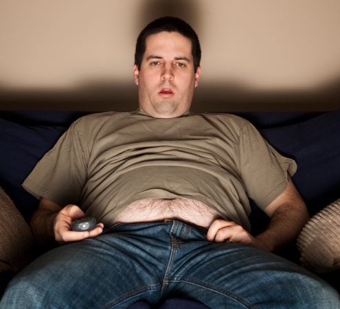 Overweight slob watching TV