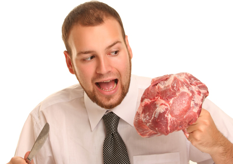 man eating steak