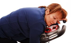 tired woman on bike