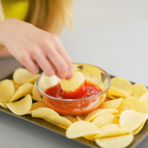 women eating chips