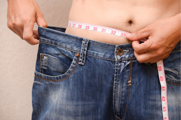 Measuring waistline to track progress with weight loss over 40